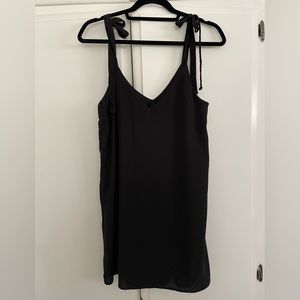 Classic black dress with straps. Size medium
